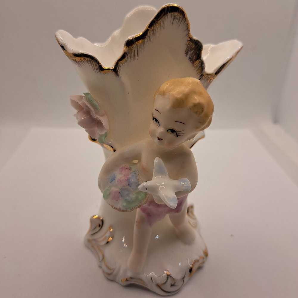 Cherub Gold trimmed vase.
